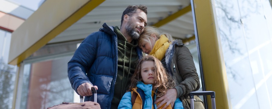 Flüchtlingsfamilie bei der Ankunft in Deutschland